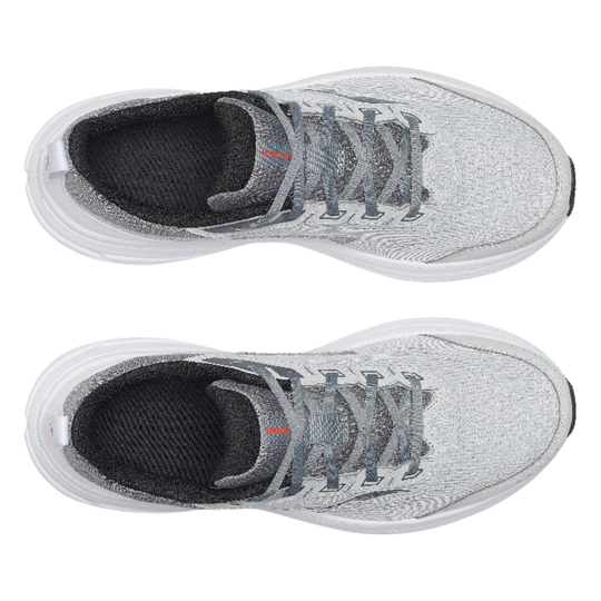 Pair of gray athletic shoes with black soles on a white background