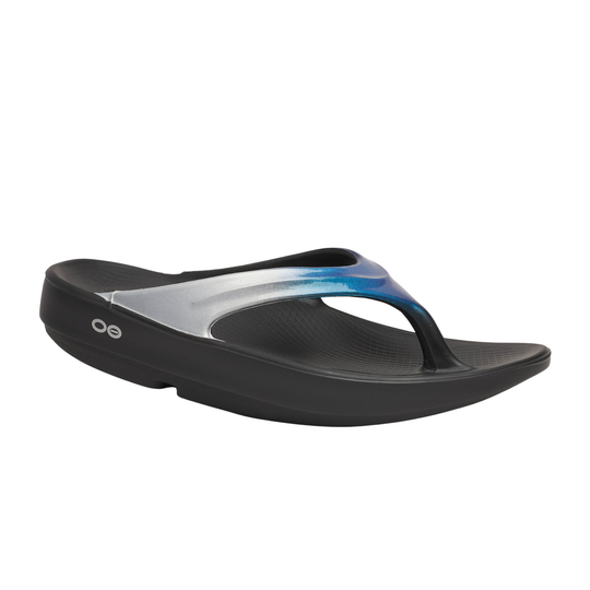 Black sandal with a gradient strap on a white background