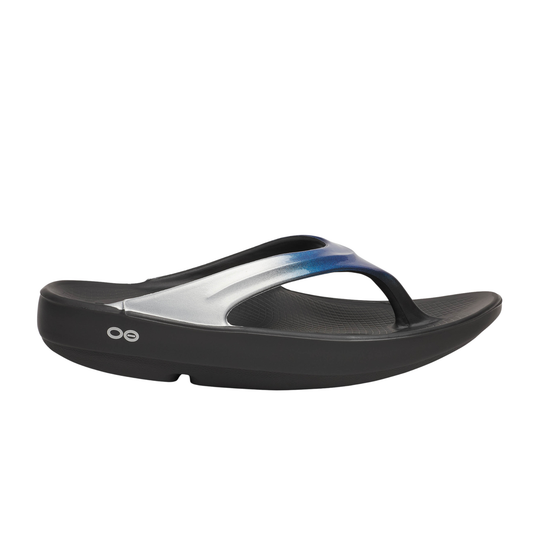 Black sandal with a gradient strap on a white background
