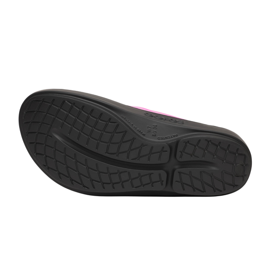 Black sole of a shoe with tread pattern on a white background
