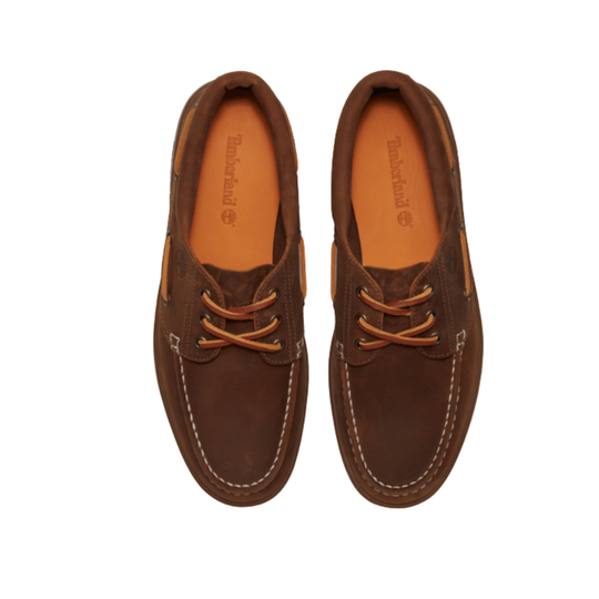 Pair of brown shoes on a white background