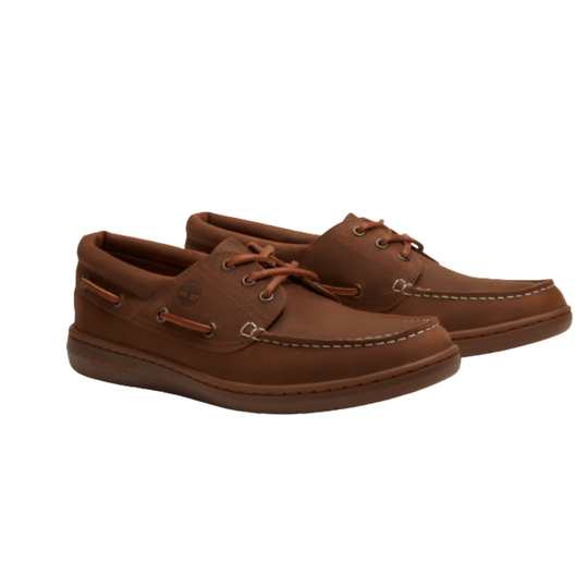 Pair of brown shoes on a white background