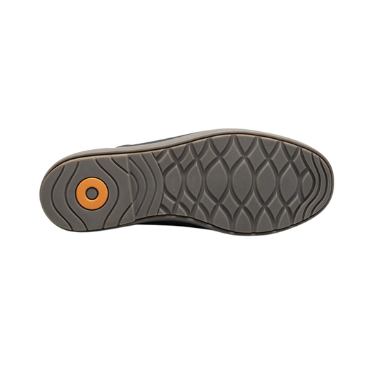 Grey boot sole with orange Bogs logo at the heel