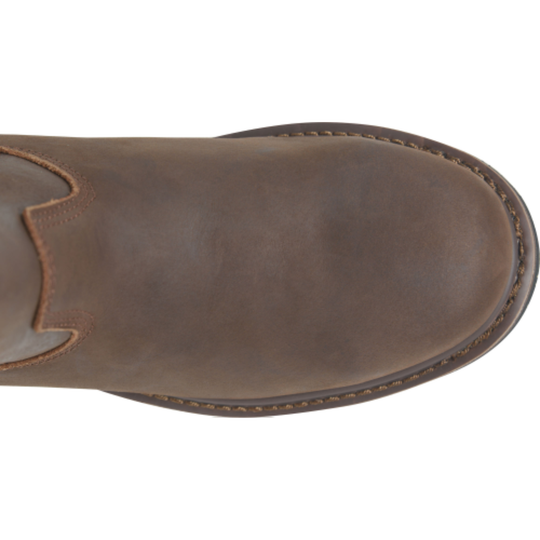 Close-up of a brown leather boot sole on a white background