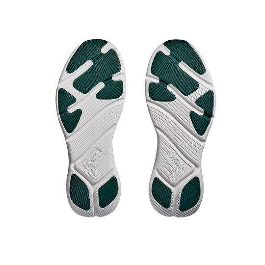 Shoe sole with green and white design on a white background