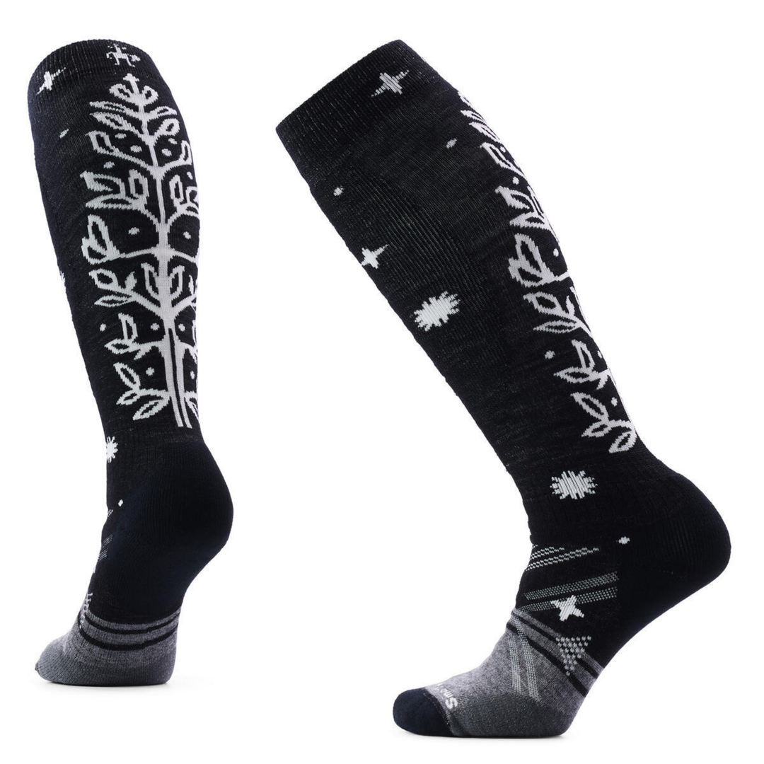 Black knee-high socks with white floral patterns on a white background