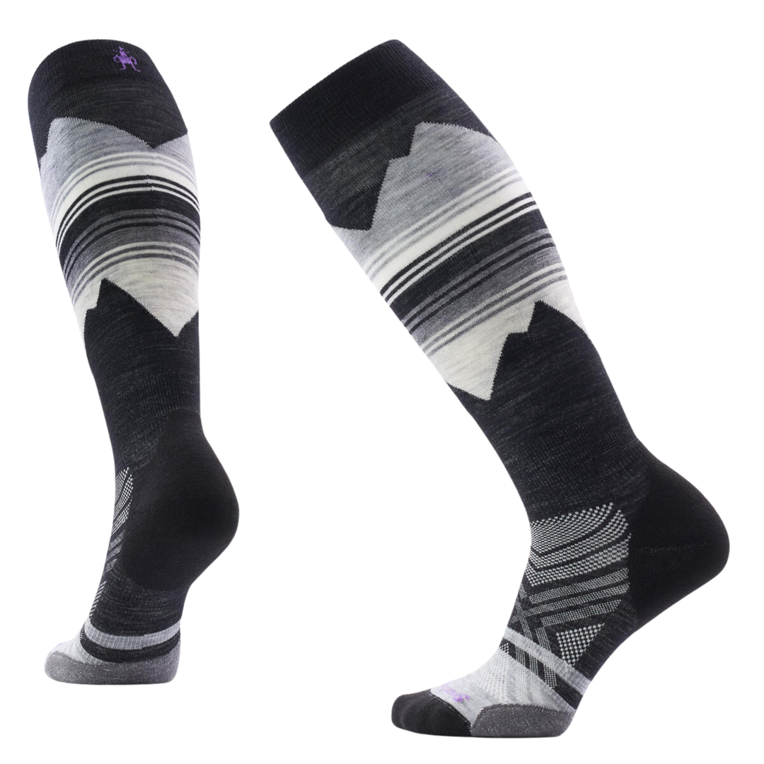 Pair of black and gray patterned knee-high socks on a white background