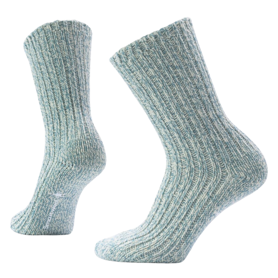 Pair of light blue socks on a white background