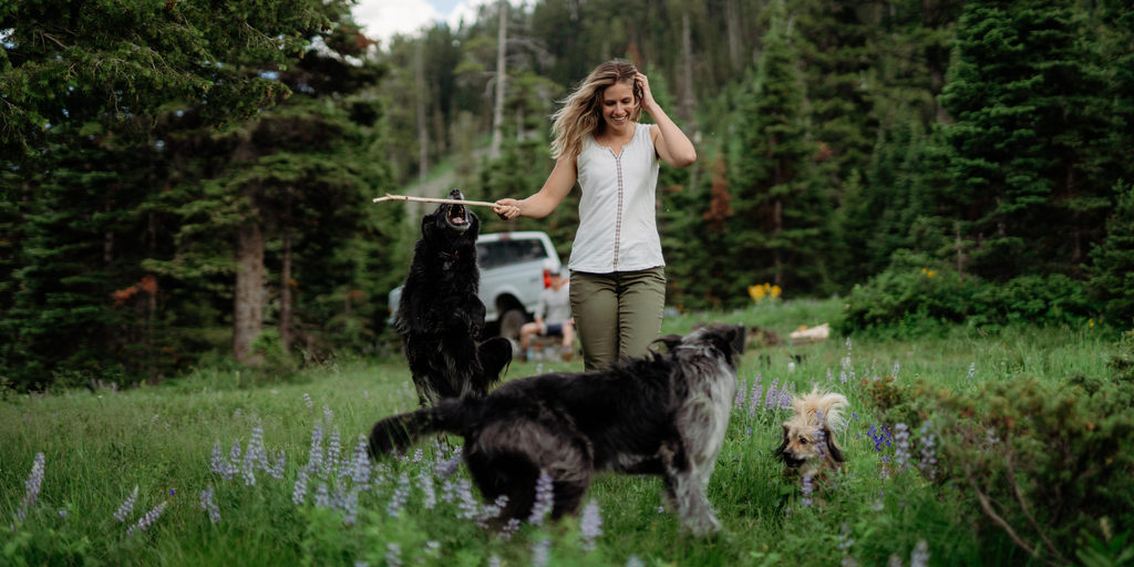 Kuhl Female Model With 3 Dogs