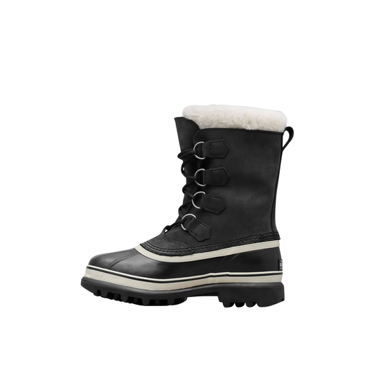 Black winter boot with white fur lining on a white background