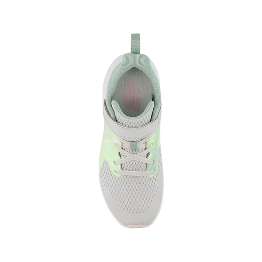Light gray and green sneaker on a white background