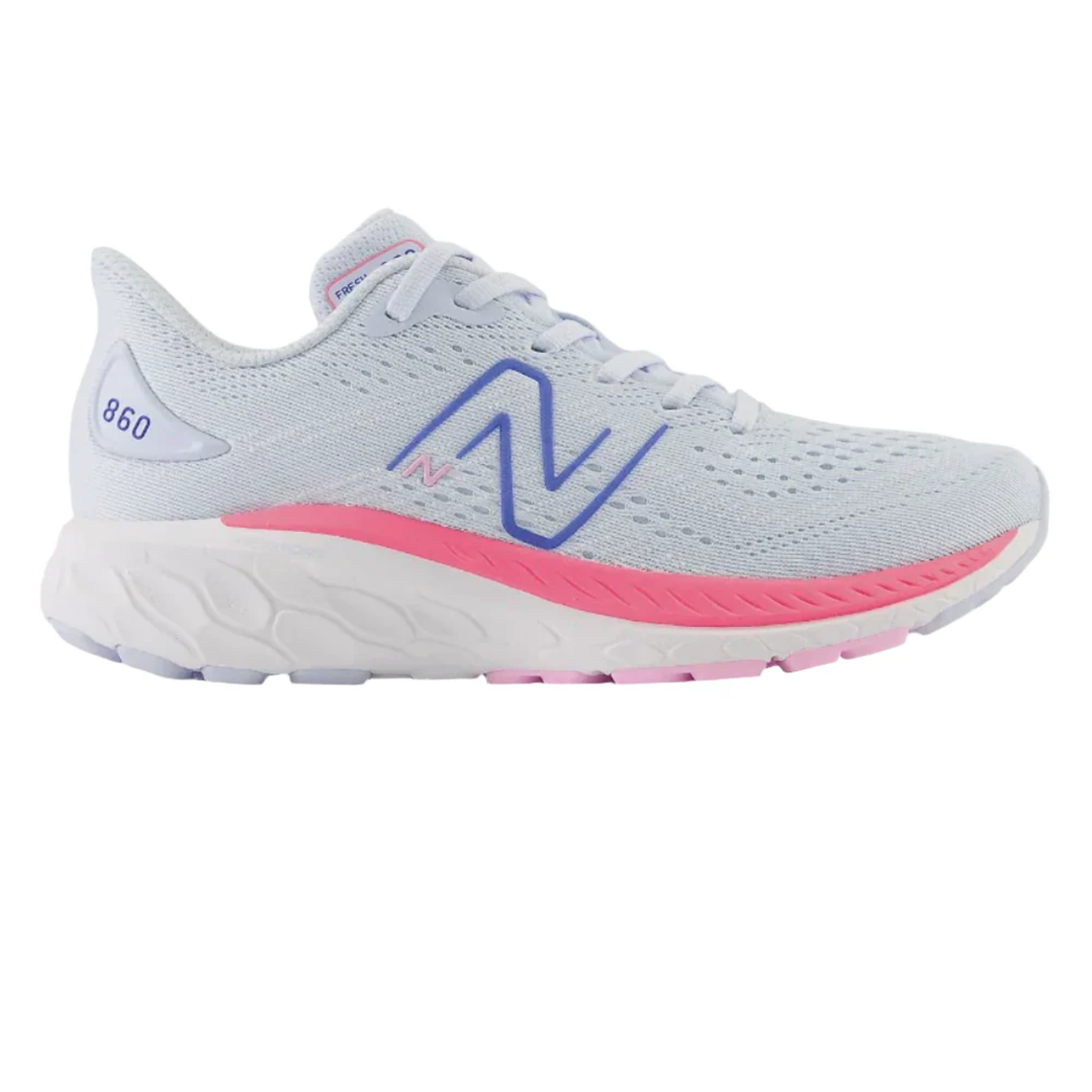 Gray running shoe with pink sole on a white background