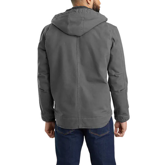 Person wearing a gray jacket with a hood on a white background