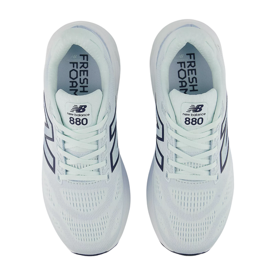 Pair of white running shoes with laces and navy side logos, shown from above