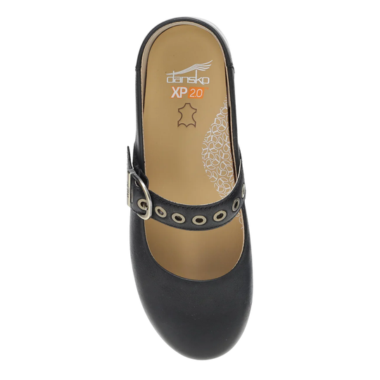 Black clog shoe with a strap on a white background