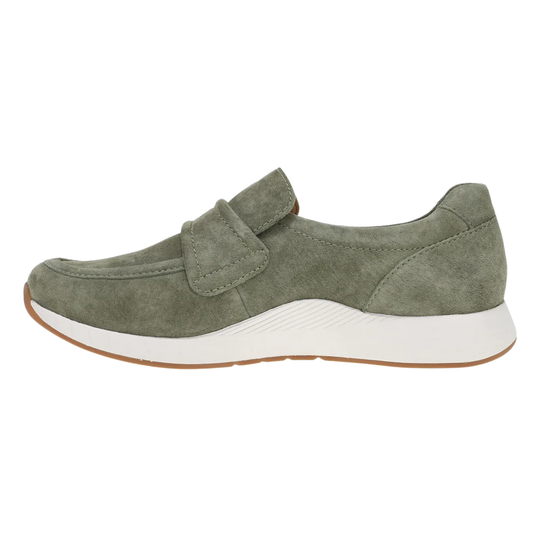 Green suede shoe with a white sole on a white background