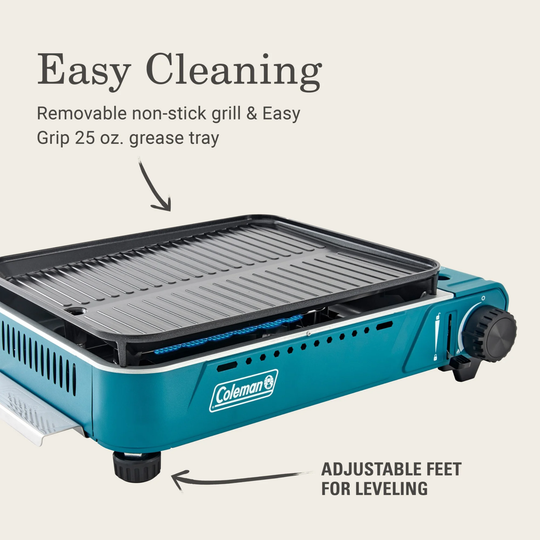 Blue Coleman portable grill with features highlighted on a white background