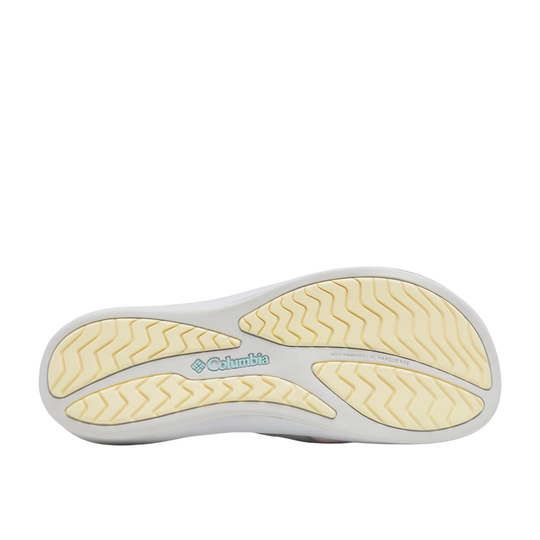 White sandal sole with yellow tread and Columbia logo at center