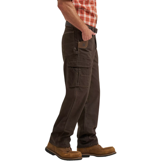 Person wearing brown cargo pants on a white background