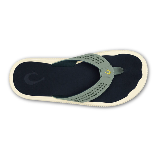 Flip-flop sandal with green strap on a white background