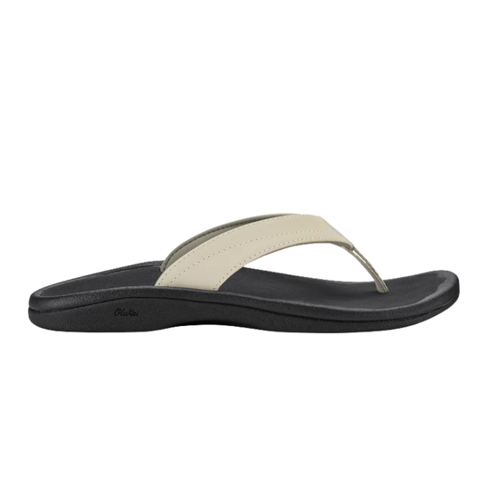 Black and beige sandal on a white background