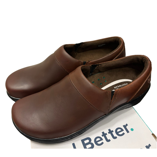 Pair of brown shoes on a white background with 'Better' branding.