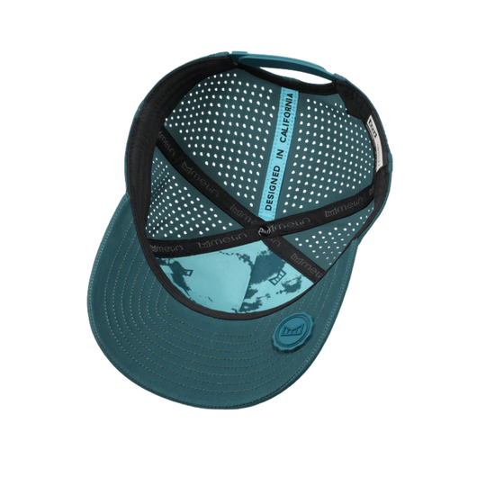 Teal baseball cap with black mesh back on a white background