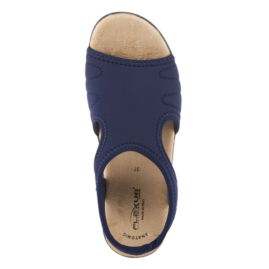 Navy blue sandal with tan insole on a white background