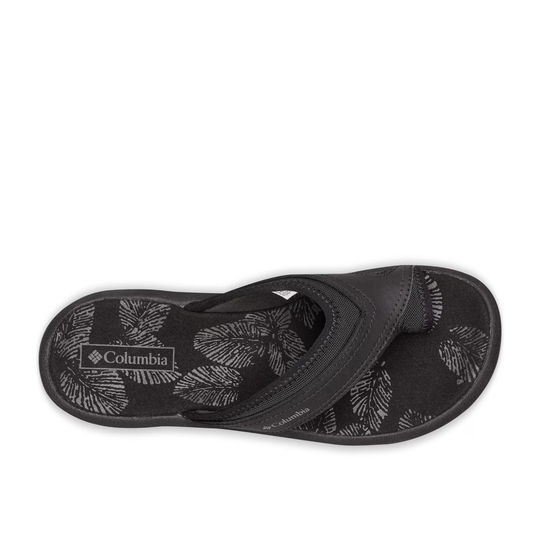 top view of black sandal with Columbia logo and floral design on white background