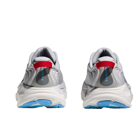 grey sneakers with red accents and blue soles on a white background