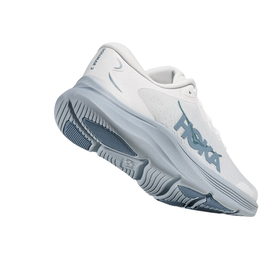 White and blue sneaker with 'Fila' branding on a white background