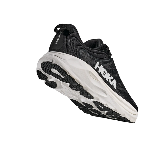 black hoka shoe with white sole