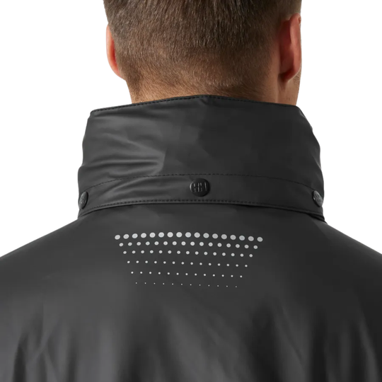 Black jacket with a pattern on the back against a light gray background
