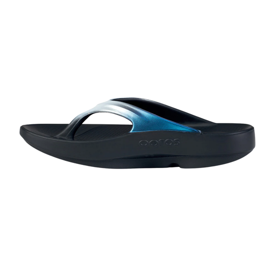 black flip flop with hue of blue