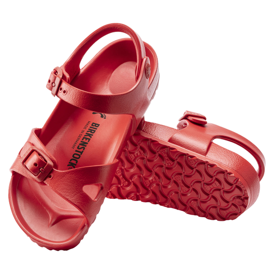 Red sandal with 'Birkenstock' branding on a white background