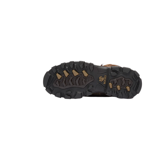 Close-up of a hiking boot sole with brand logo on a white background