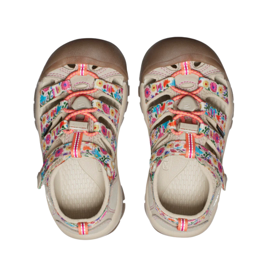 Pair of children's sandals with colorful laces on a white background
