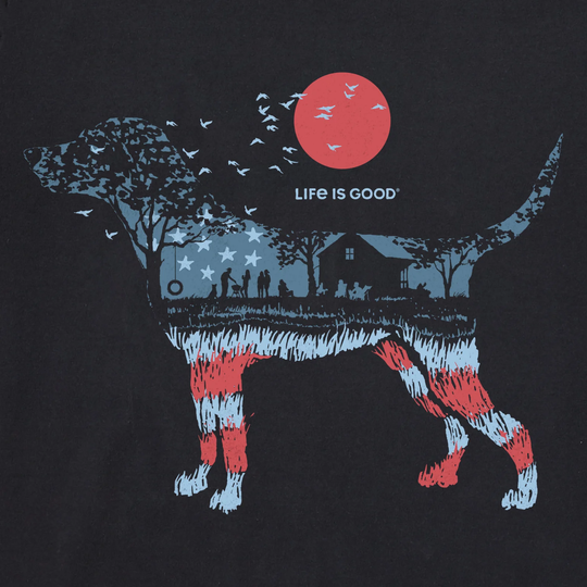 Black t-shirt with a graphic of a dog and sunset design