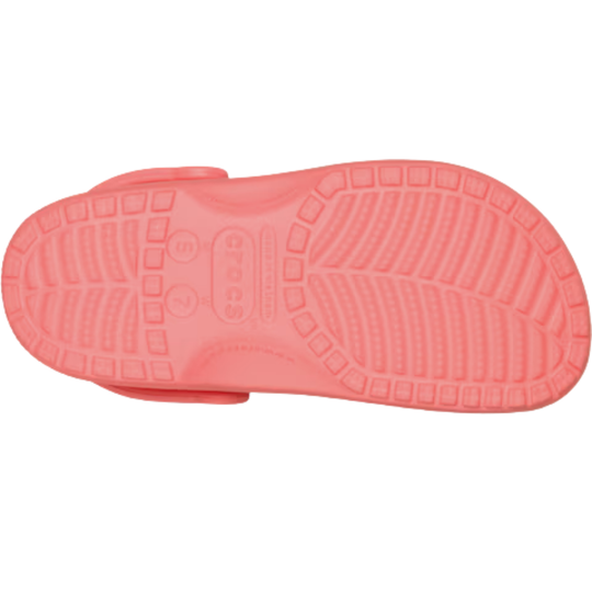 Pink sandal sole with textured pattern on a white background