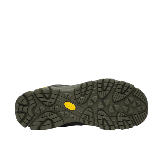 Black shoe sole with a yellow label on a white background