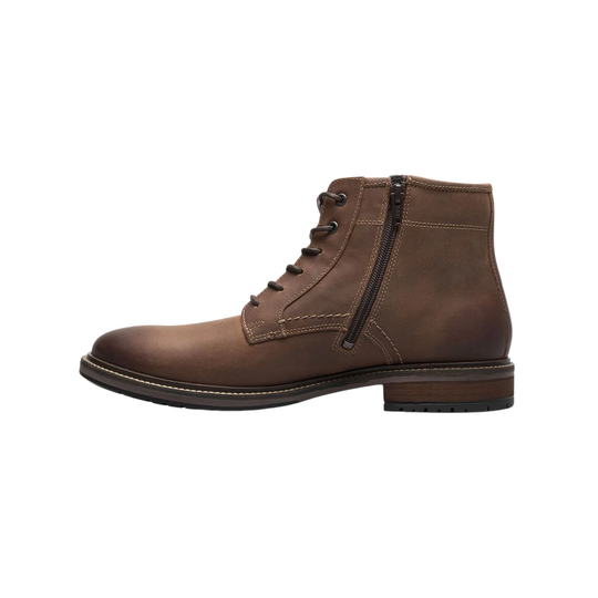 Brown leather boot with a zipper on a white background