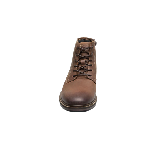 Brown leather boot on a white background