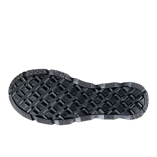 Black shoe sole with tread pattern on a white background