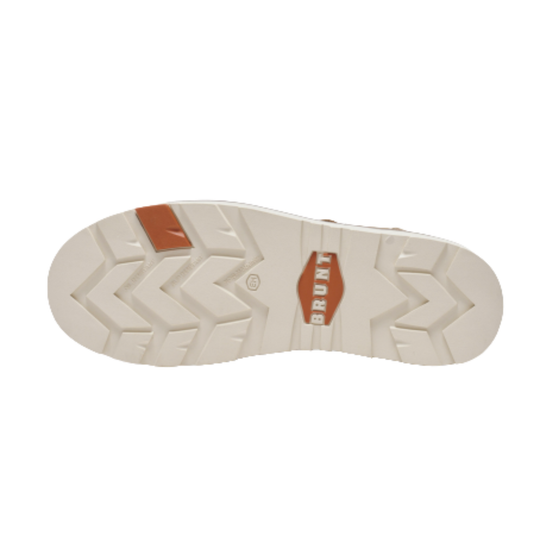 Close-up of a shoe sole with a brand logo on a white background