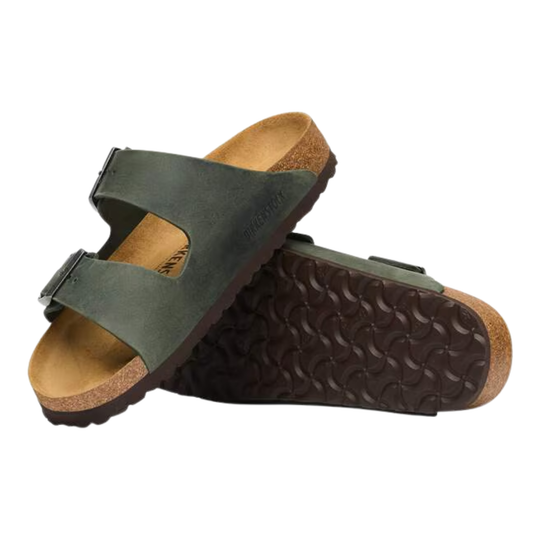 Green sandals with cork insole on a white background