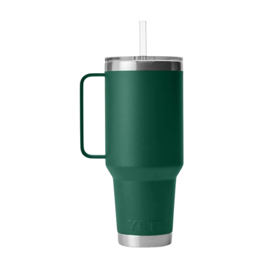 A dark green YETI insulated tumbler with a matching green handle, a clear lid, and a clear straw, shown on a plain white background.