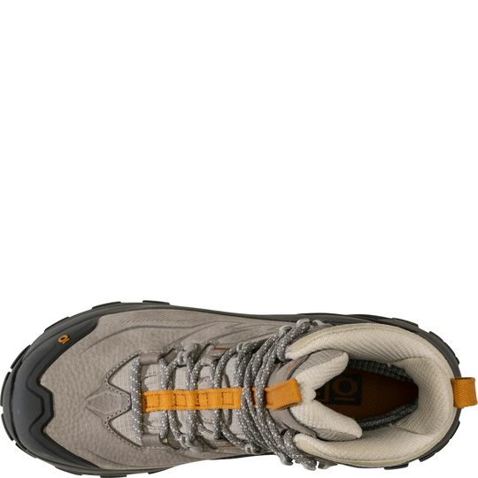 Hiking boot with orange accents on a white background