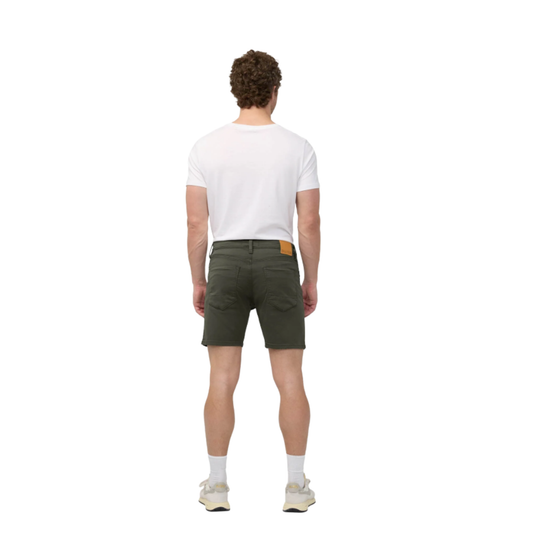 Man wearing a white t-shirt and green shorts on a white background