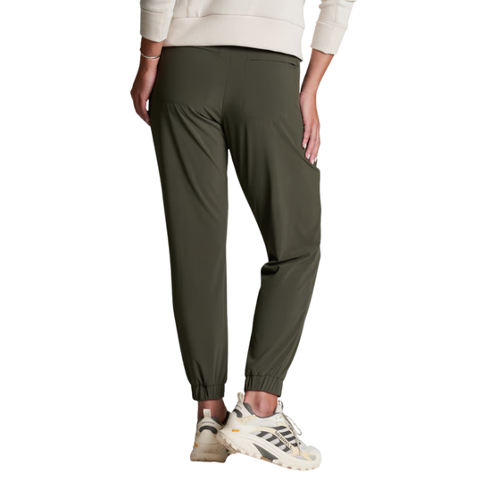 A person wearing olive green jogger-style pants with elastic cuffs, shown from the waist down against a plain white background.
