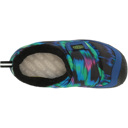 A Keen brand slip-on water shoe featuring a vibrant tie-dye pattern in blue, green, and pink over a black base, with a black fuzzy interior lining and a small yellow Keen logo patch on the side.